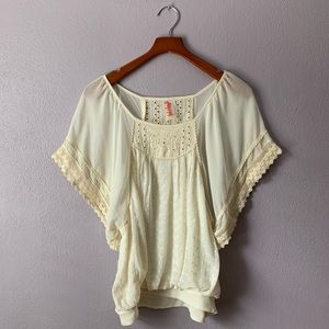 Free People eyelet peasant blouse in ivory.